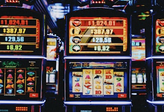 Colorful icons representing different game categories like rummy and slots.